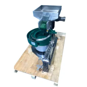 vibratory bowl feeder for tube cap