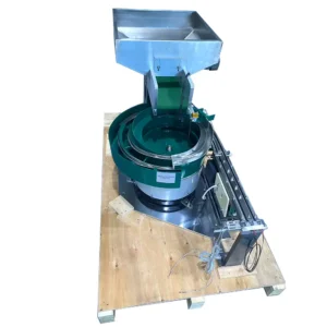 two tracks viratory feeder for tube cap