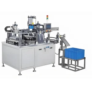 Automatic assembly machine for IV drip caps