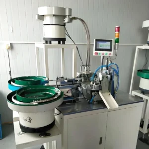 Spring assembly machine